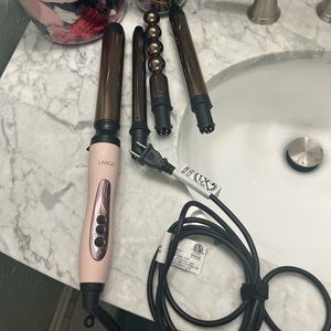 Lange hair curler never used , different curl adapters for for 150 asking 55
